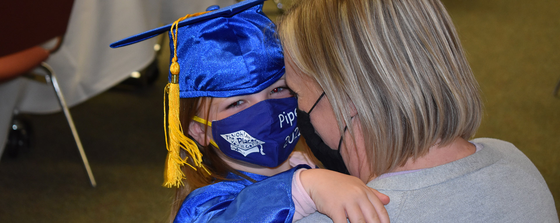 Little Learners graduate with mother